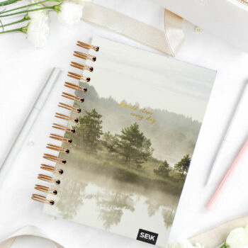 Happy Calendar planner spiral binding forest 2026